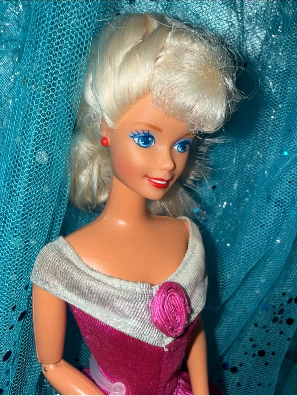 2 Barbie dolls in dresses 1 vintage 1 new chair not included